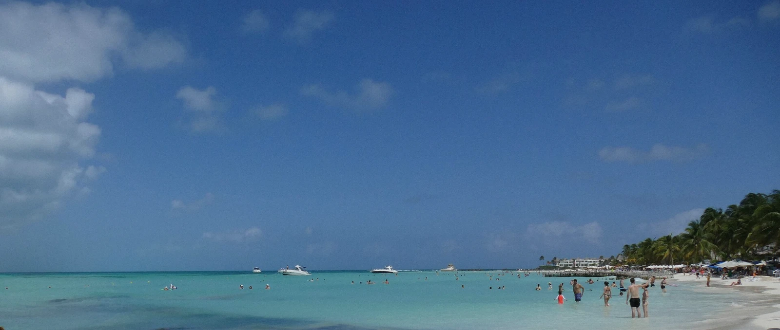 Wide view of Playa Norte beach with clear shallow water on Isla Mujeres, Mexico